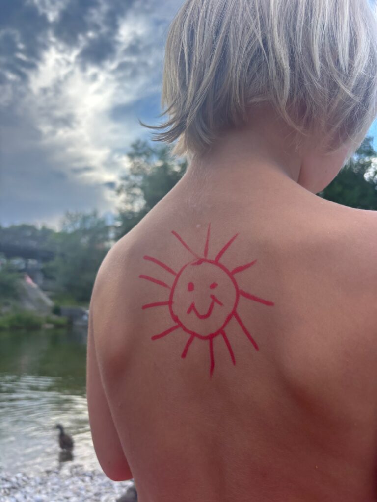 Kind mit Sonne